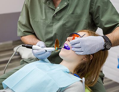 ADG Dentist Examination Girl's Teeth in Clinic